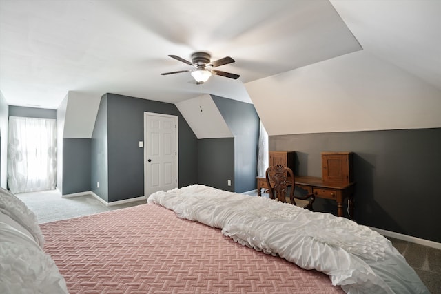 carpeted bedroom with lofted ceiling and ceiling fan