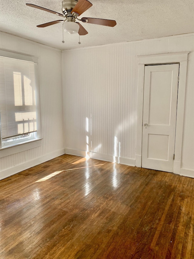 1616 Kendale Ave, Memphis, TN 38106 - spare room with a ceiling fan, hardwood / wood-style floors, and a textured ceiling