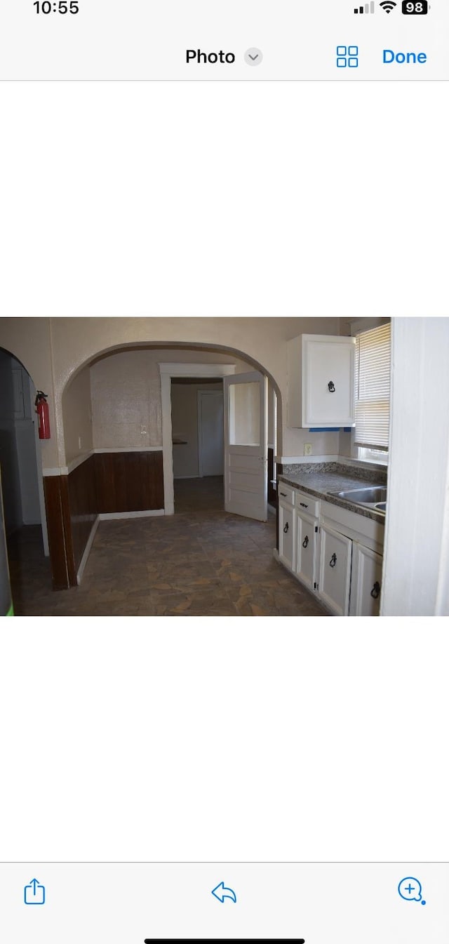 kitchen with sink and white cabinets