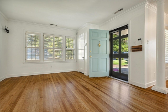 foyer featuring hardwood / wood-style floors and plenty of natural light