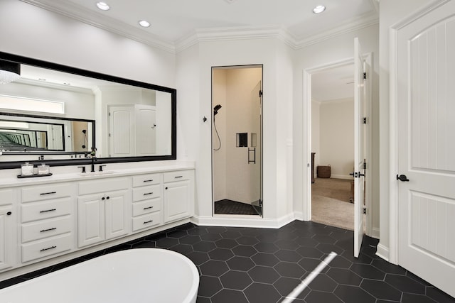 bathroom with vanity, crown molding, tile patterned floors, and separate shower and tub