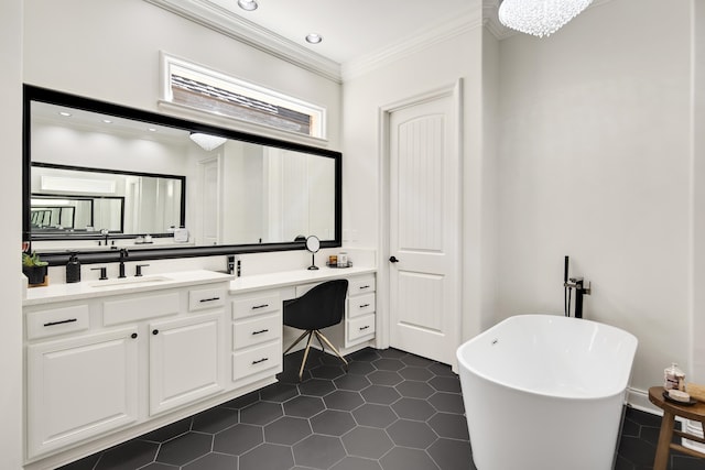 bathroom with tile patterned flooring, crown molding, vanity, a chandelier, and a bath