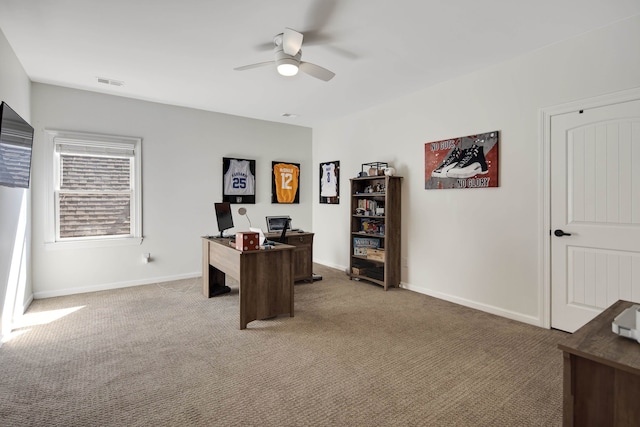 office space featuring carpet flooring and ceiling fan