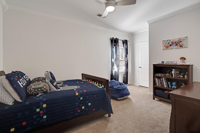 bedroom with ceiling fan, crown molding, and light colored carpet