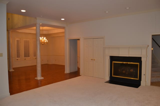 unfurnished living room featuring dark wood-type flooring and ornamental molding