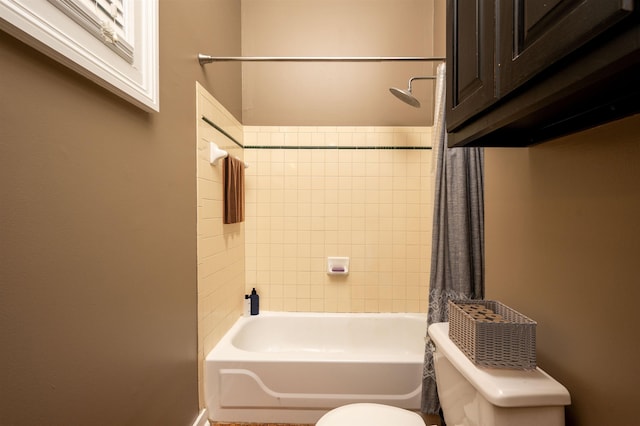 376 Mulberry St, Memphis, TN 38103 - bathroom with shower / bath combo with shower curtain and toilet