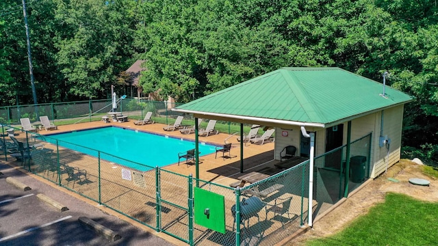 view of swimming pool featuring a patio