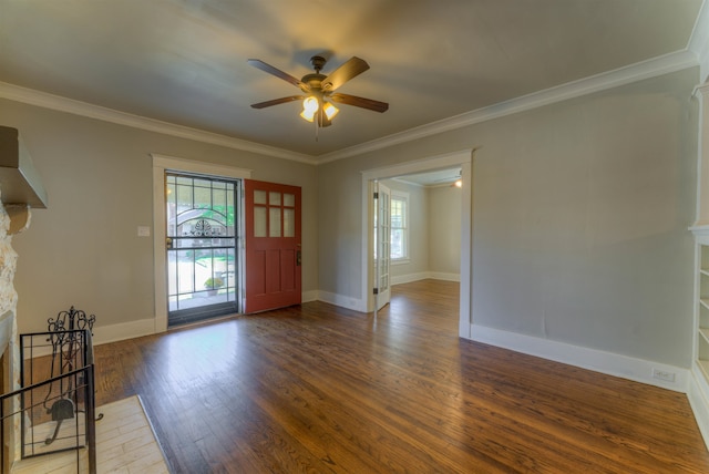 foyer featuring dark wood-type flooring, crown molding, and ceiling fan