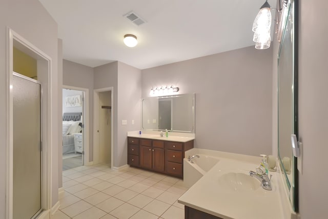 bathroom with vanity, separate shower and tub, and tile patterned flooring