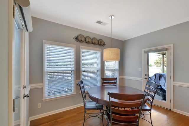 dining room featuring wood-type flooring