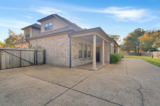 view of property exterior featuring a patio