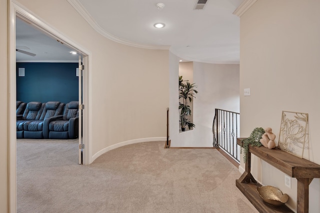 hallway with light carpet and ornamental molding