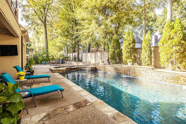 view of pool featuring pool water feature and a patio area