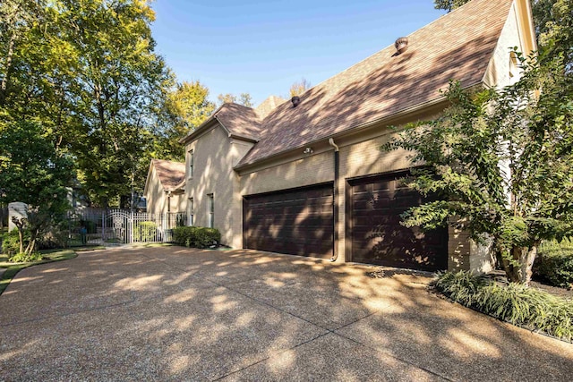 view of home's exterior with a garage