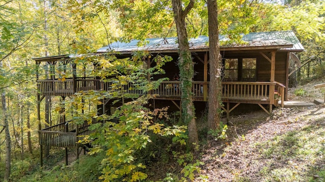 exterior space featuring a wooden deck