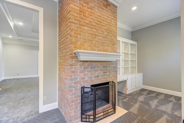 unfurnished living room featuring crown molding, a brick fireplace, and dark colored carpet