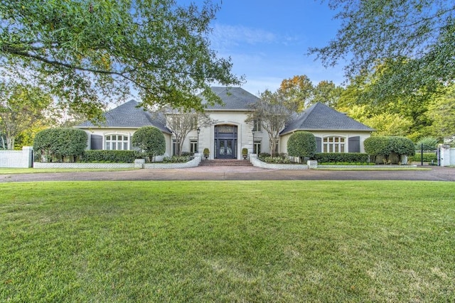 view of front of property with a front lawn