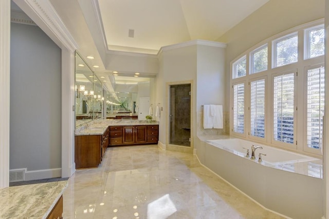 bathroom with vanity, crown molding, a notable chandelier, and plus walk in shower