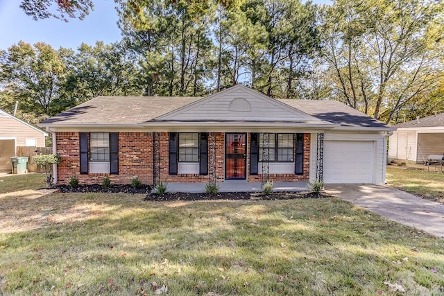 single story home with covered porch, a garage, and a front lawn