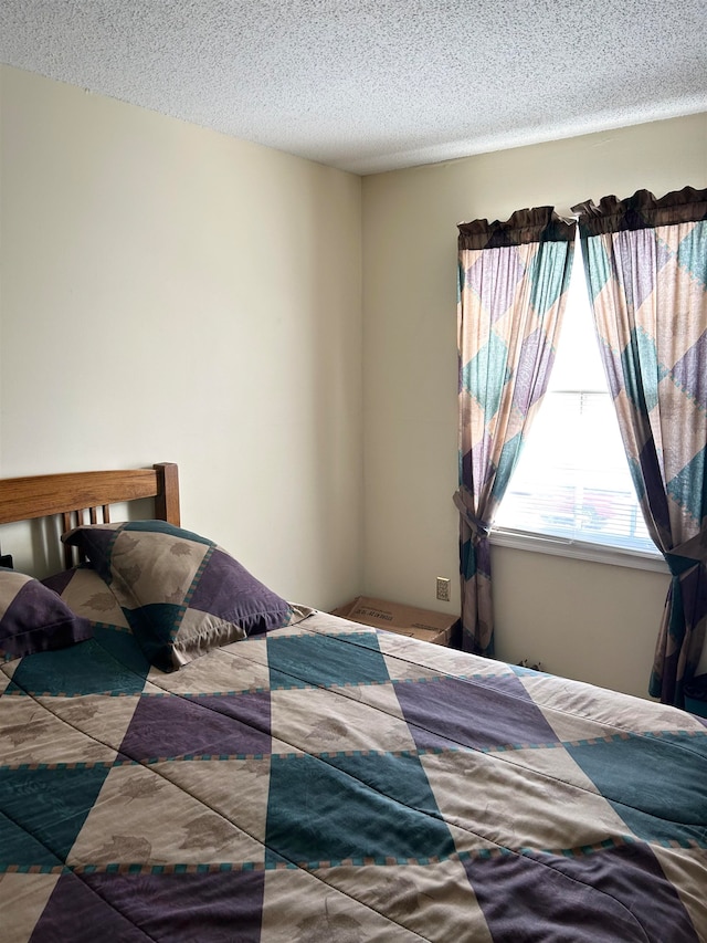 bedroom with a textured ceiling