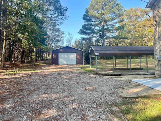 exterior space with a garage and a carport