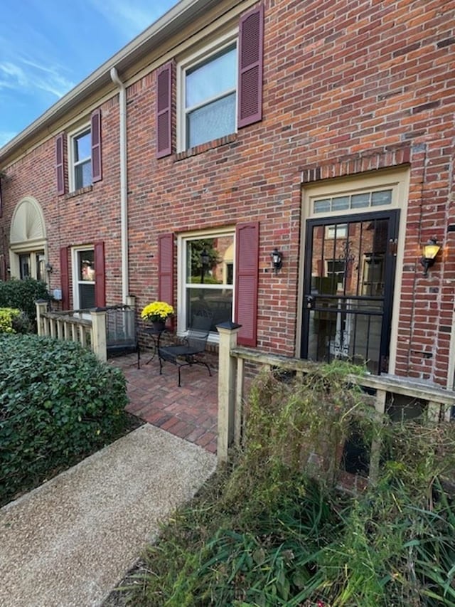 back of house featuring a patio area