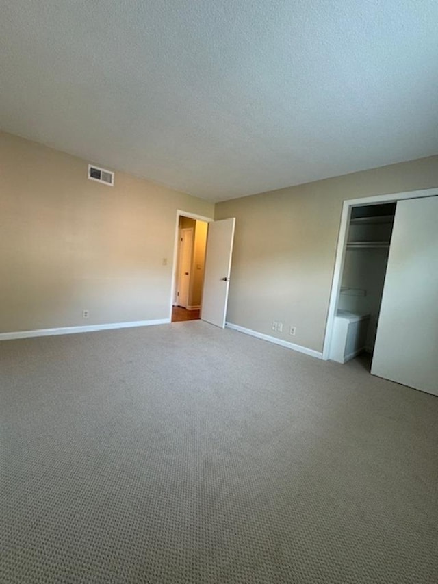 1231 Chamberlain Dr Unit 1231, Memphis, TN 38119 - unfurnished bedroom featuring visible vents, baseboards, carpet floors, and a closet