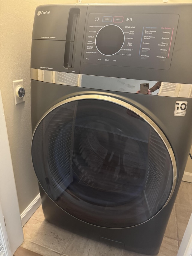 1231 Chamberlain Dr Unit 1231, Memphis, TN 38119 - room details with baseboards and washer / dryer