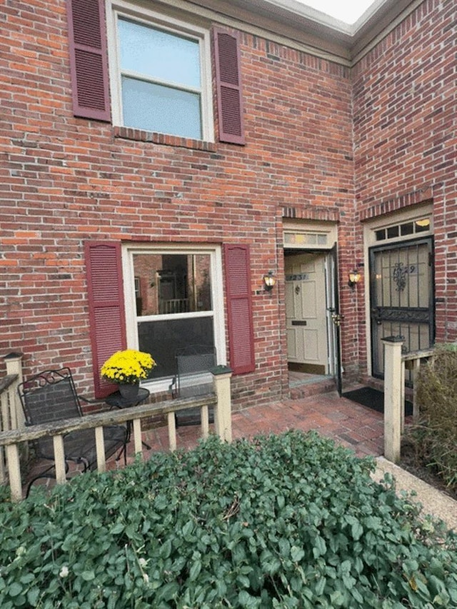 1231 Chamberlain Dr Unit 1231, Memphis, TN 38119 - property entrance with brick siding
