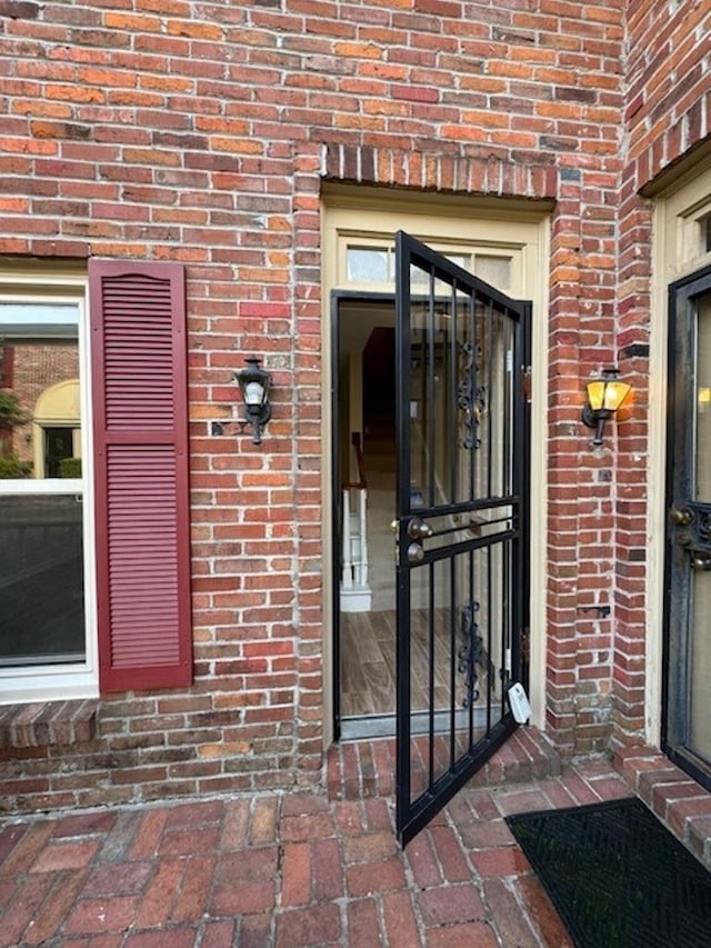 1231 Chamberlain Dr Unit 1231, Memphis, TN 38119 - view of exterior entry featuring brick siding