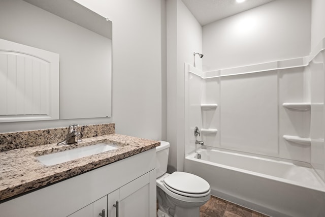 full bathroom with vanity, toilet, and shower / tub combination