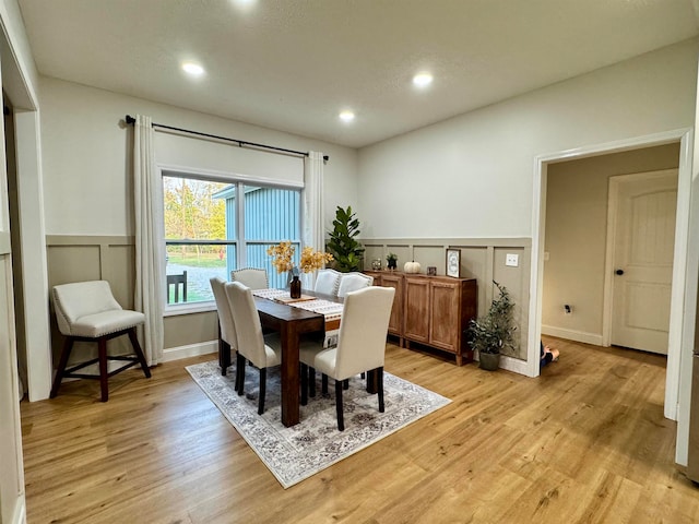 dining room with light hardwood / wood-style flooring