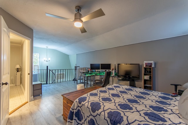 bedroom with lofted ceiling, ceiling fan with notable chandelier, and light wood-type flooring