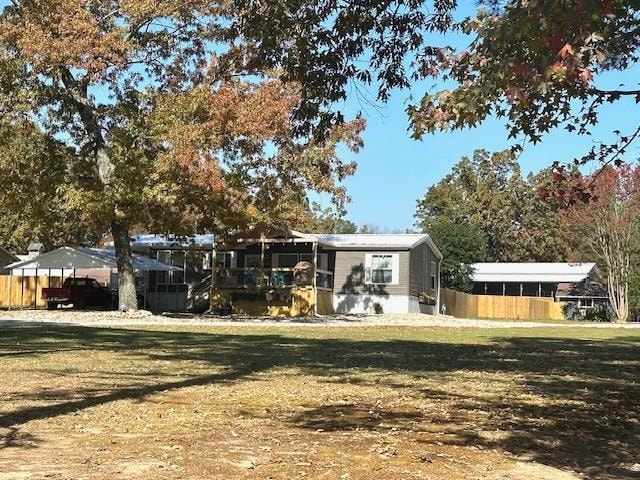 exterior space featuring a front yard