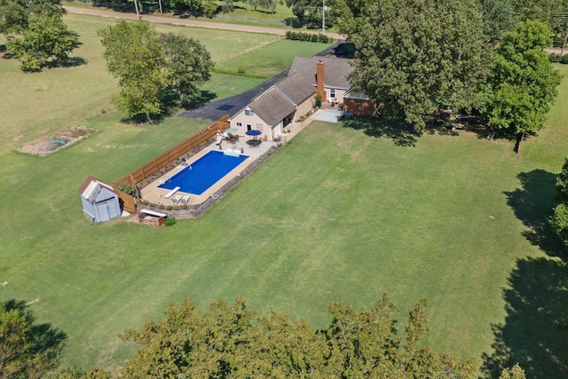 birds eye view of property featuring a rural view