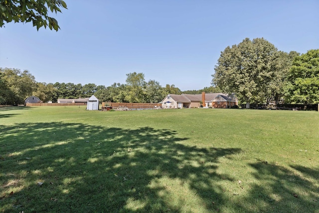 view of yard with a storage shed