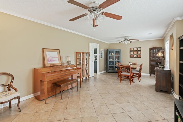 dining area featuring crown molding, a textured ceiling, ceiling fan, and light tile patterned floors