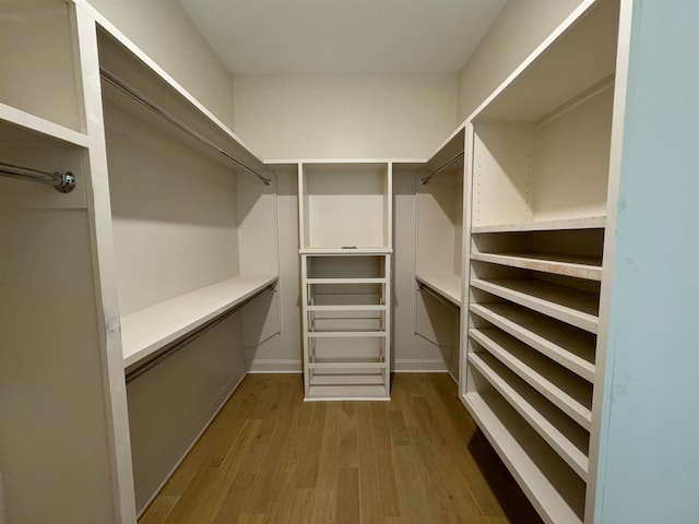 walk in closet featuring light wood-type flooring