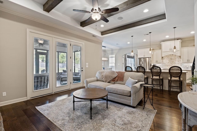 living room with beamed ceiling, dark wood-type flooring, and crown molding