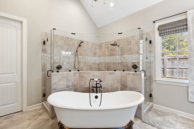 bathroom with lofted ceiling and shower with separate bathtub