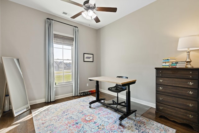 office space with dark hardwood / wood-style floors and ceiling fan