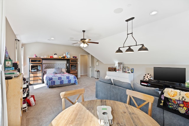 interior space with lofted ceiling and ceiling fan