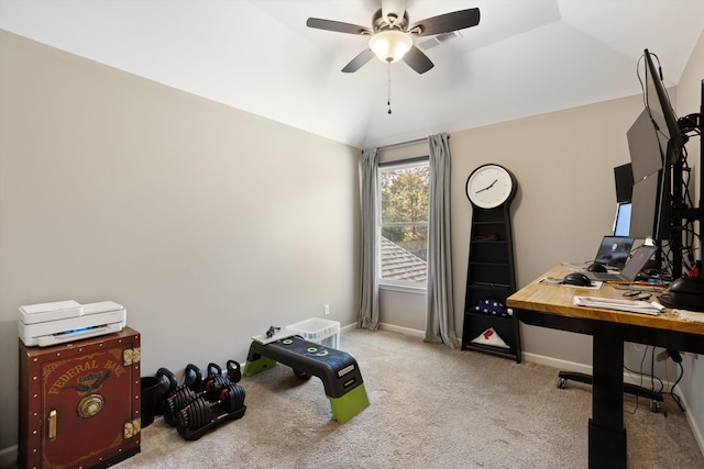 carpeted office space featuring ceiling fan and vaulted ceiling