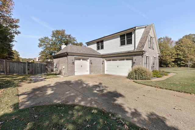 view of home's exterior featuring a yard