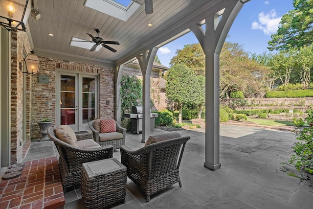 view of patio / terrace with french doors, a grill, and ceiling fan