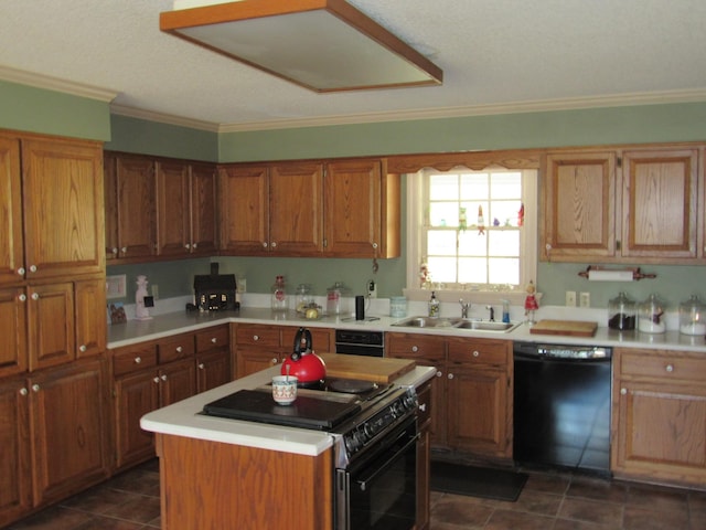 kitchen featuring dark tile patterned floors, a kitchen island, ornamental molding, sink, and black appliances