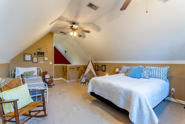 bedroom with vaulted ceiling, carpet floors, and ceiling fan