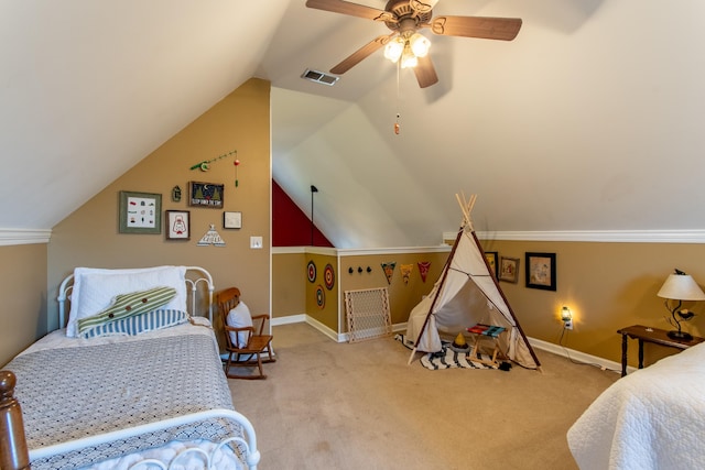 bedroom featuring lofted ceiling, ornamental molding, light colored carpet, and ceiling fan