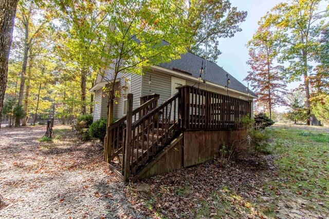 rear view of property with a deck