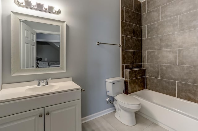 full bath featuring shower / bath combination, tile patterned floors, baseboards, vanity, and toilet